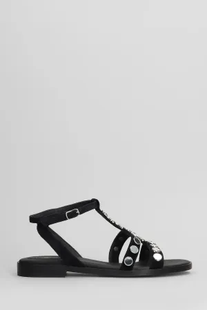 Flats in black suede