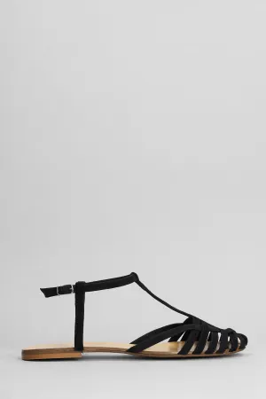 Flats in black suede