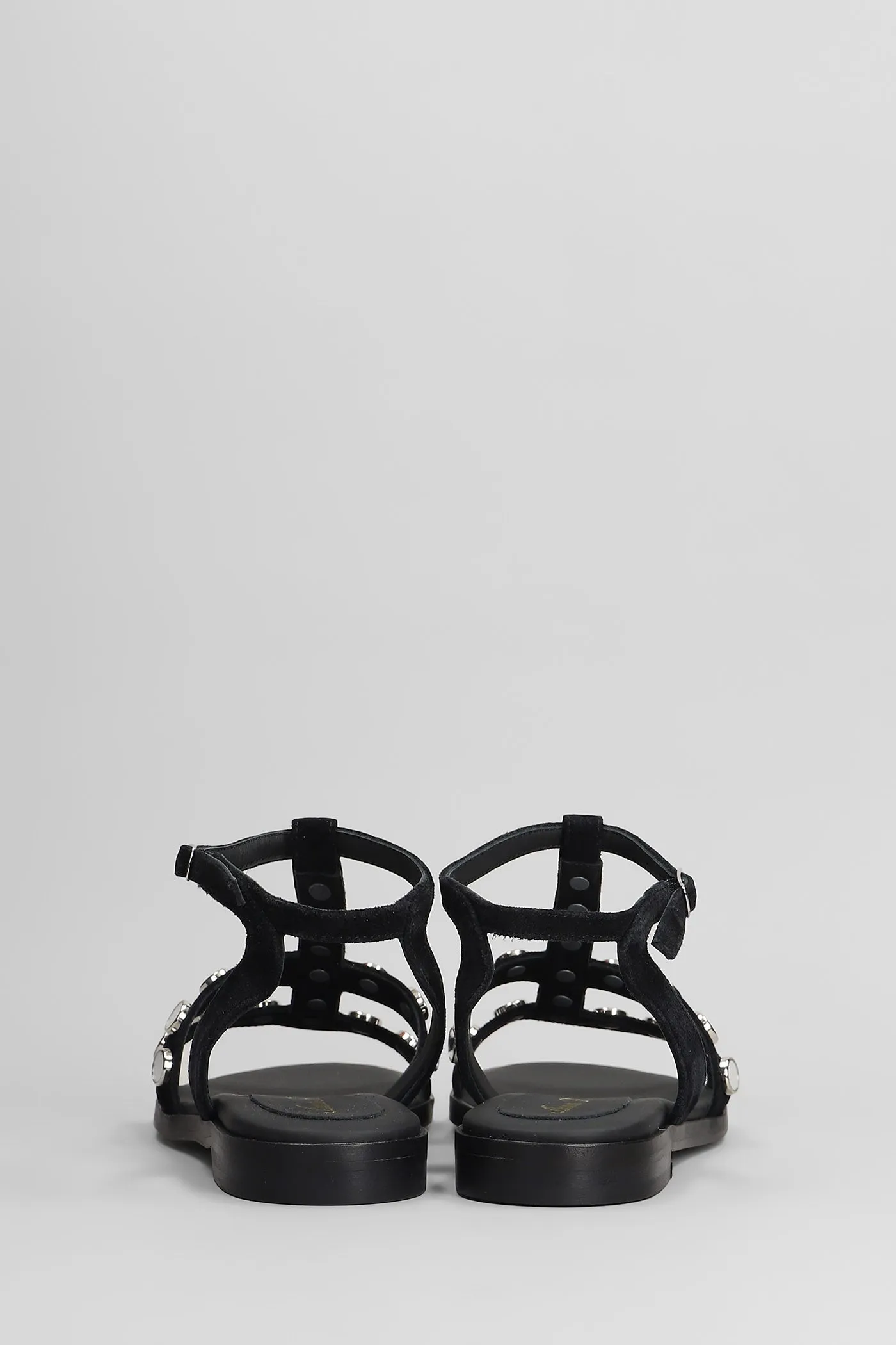 Flats in black suede