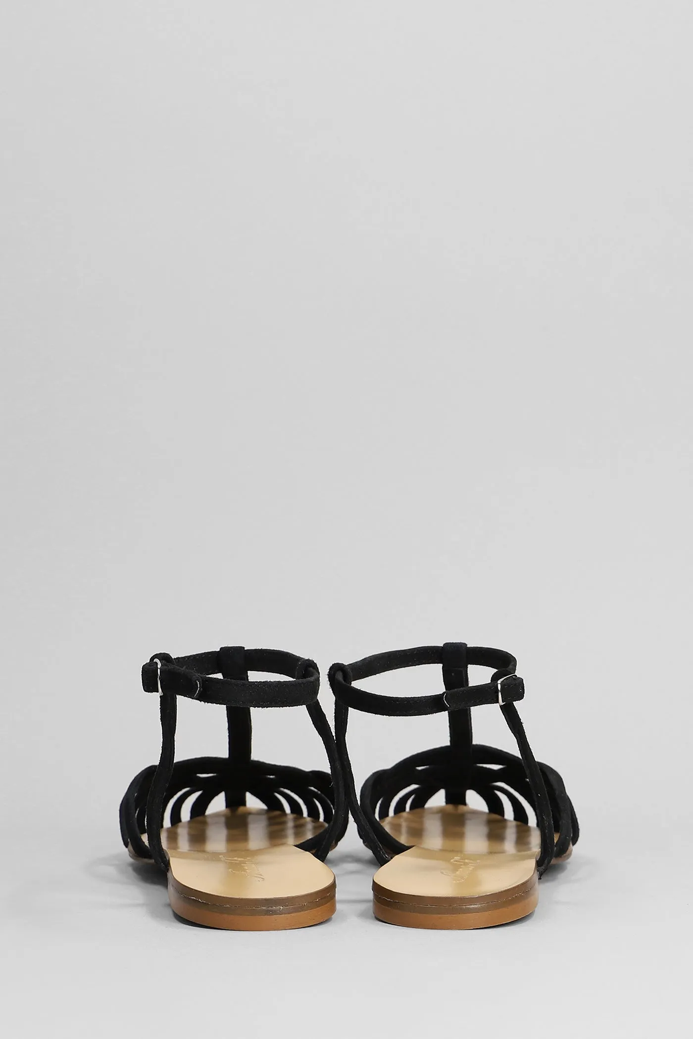 Flats in black suede
