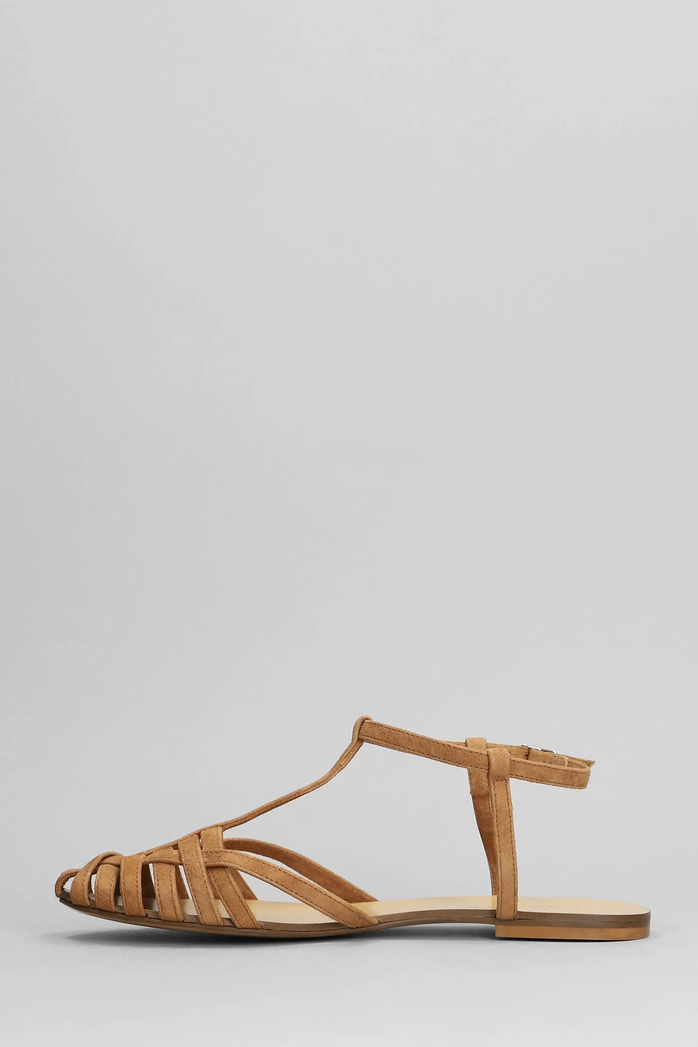 Flats in brown suede