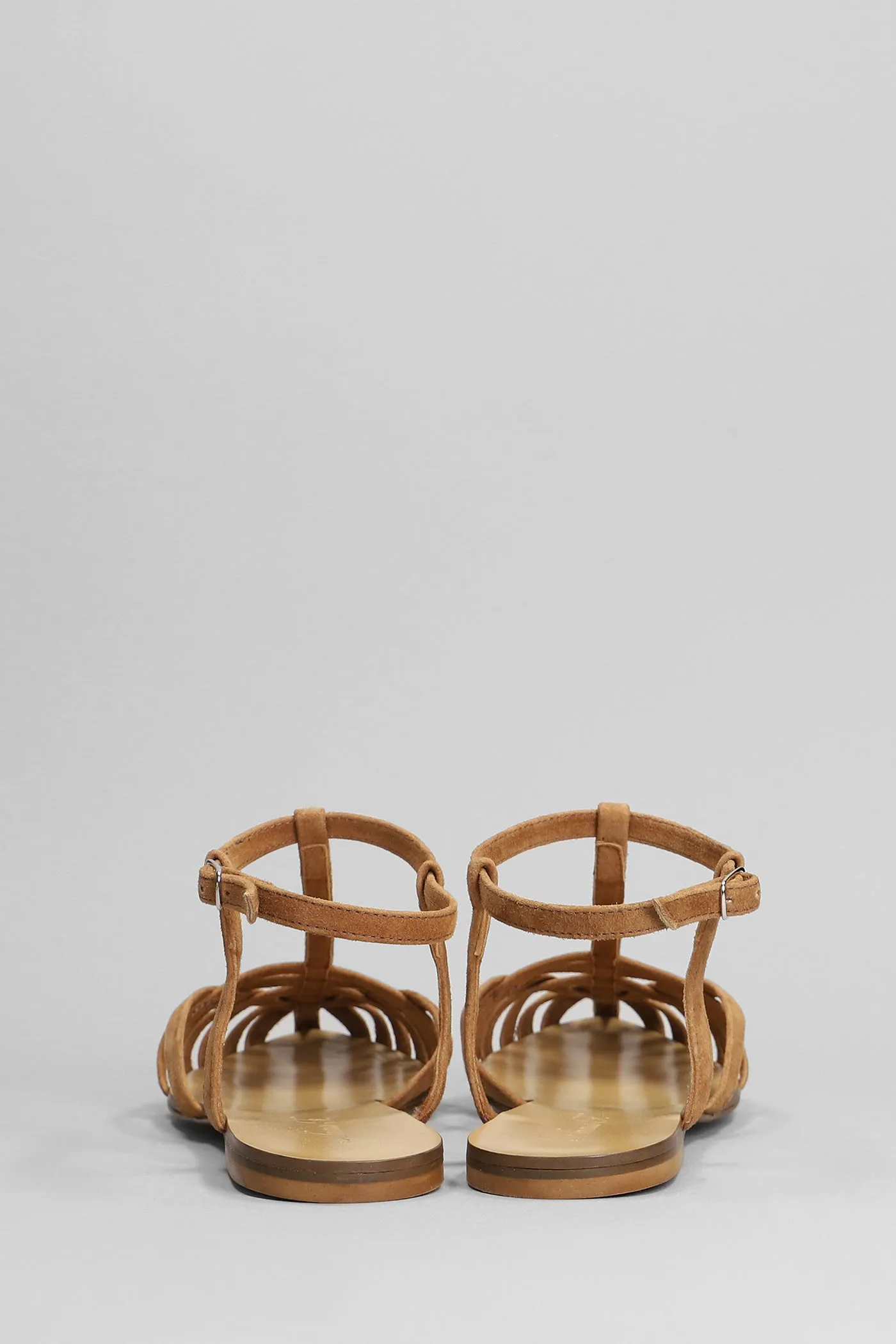 Flats in brown suede